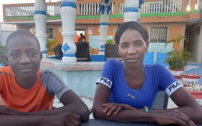 Kervenson and his mother in 2024.